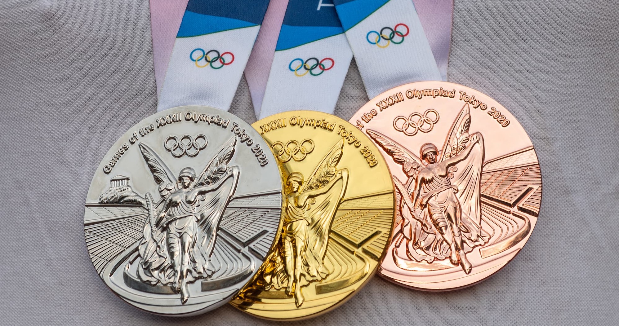 A close-up of Olympic medals