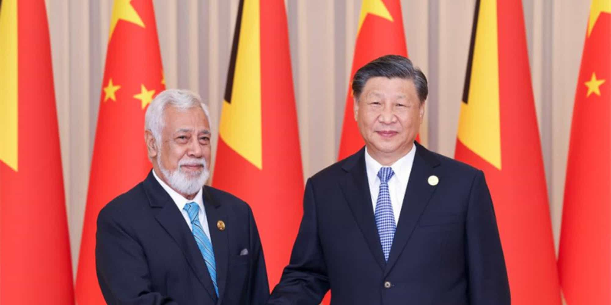 Gusmao and Xi shake hands