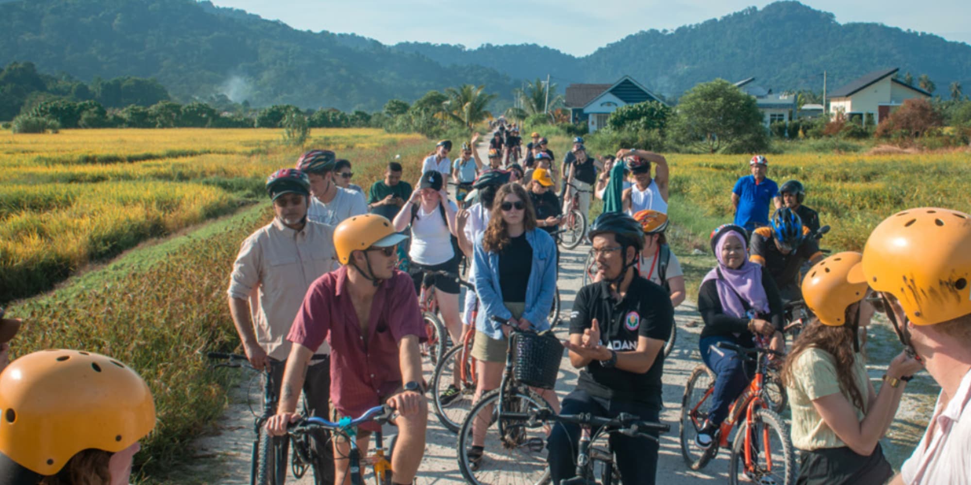 Diverse of people riding bikes in local area