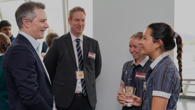 Image Minister Education Jason Clare with students and teacher