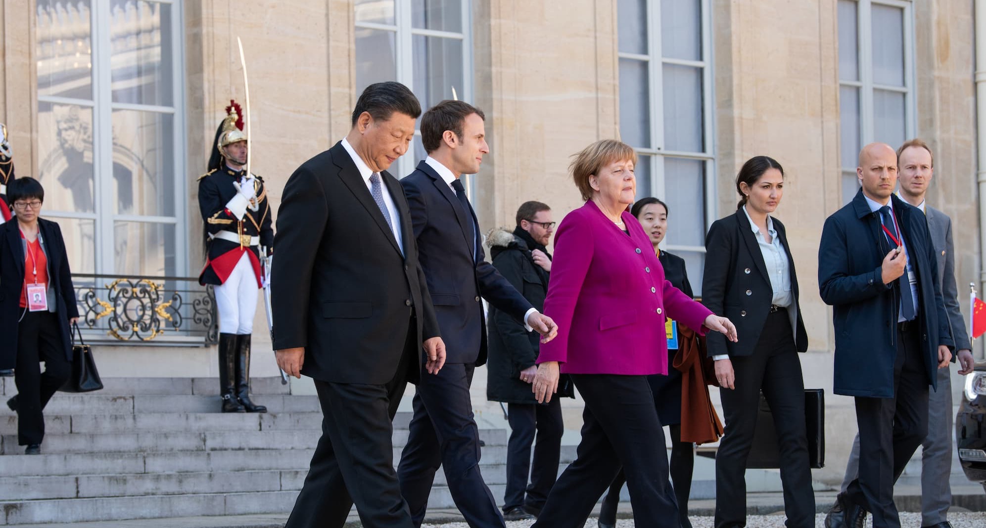 Xi Jinping, Angela Merkel and Emmanuel Macron in Paris