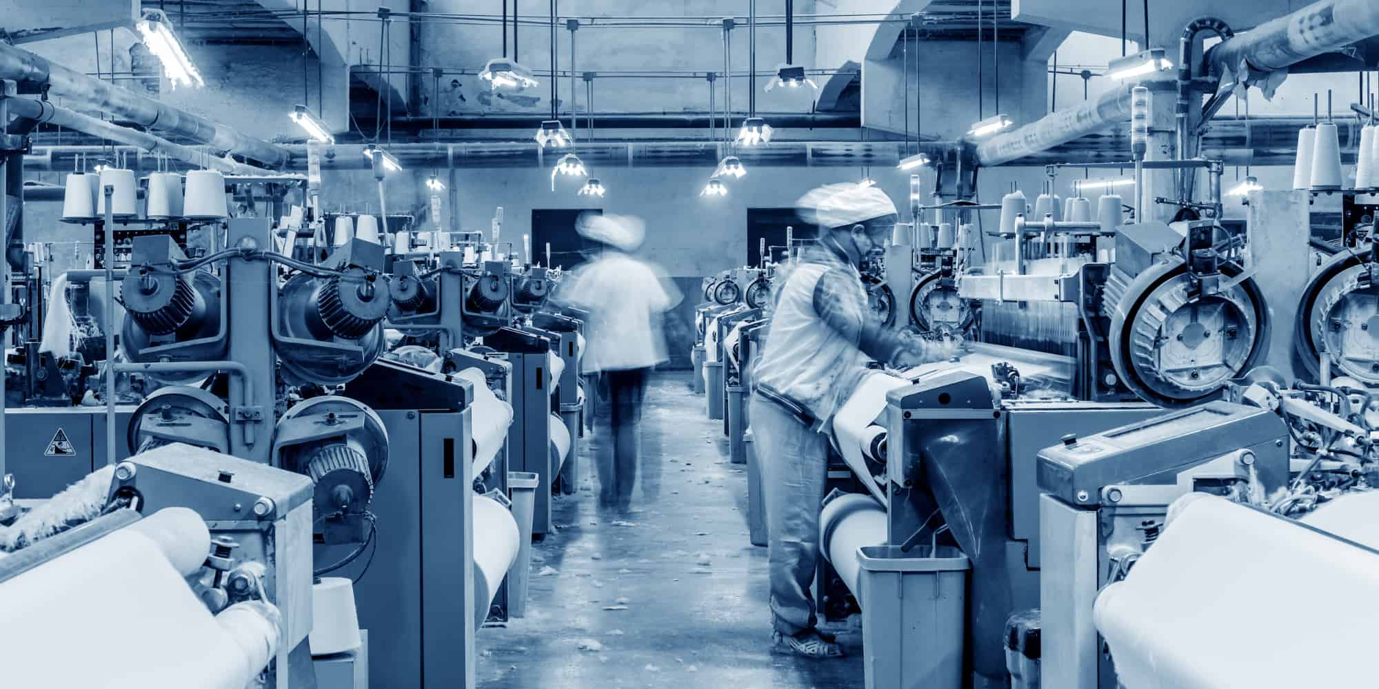 Textile mill workshop interior, working female workers