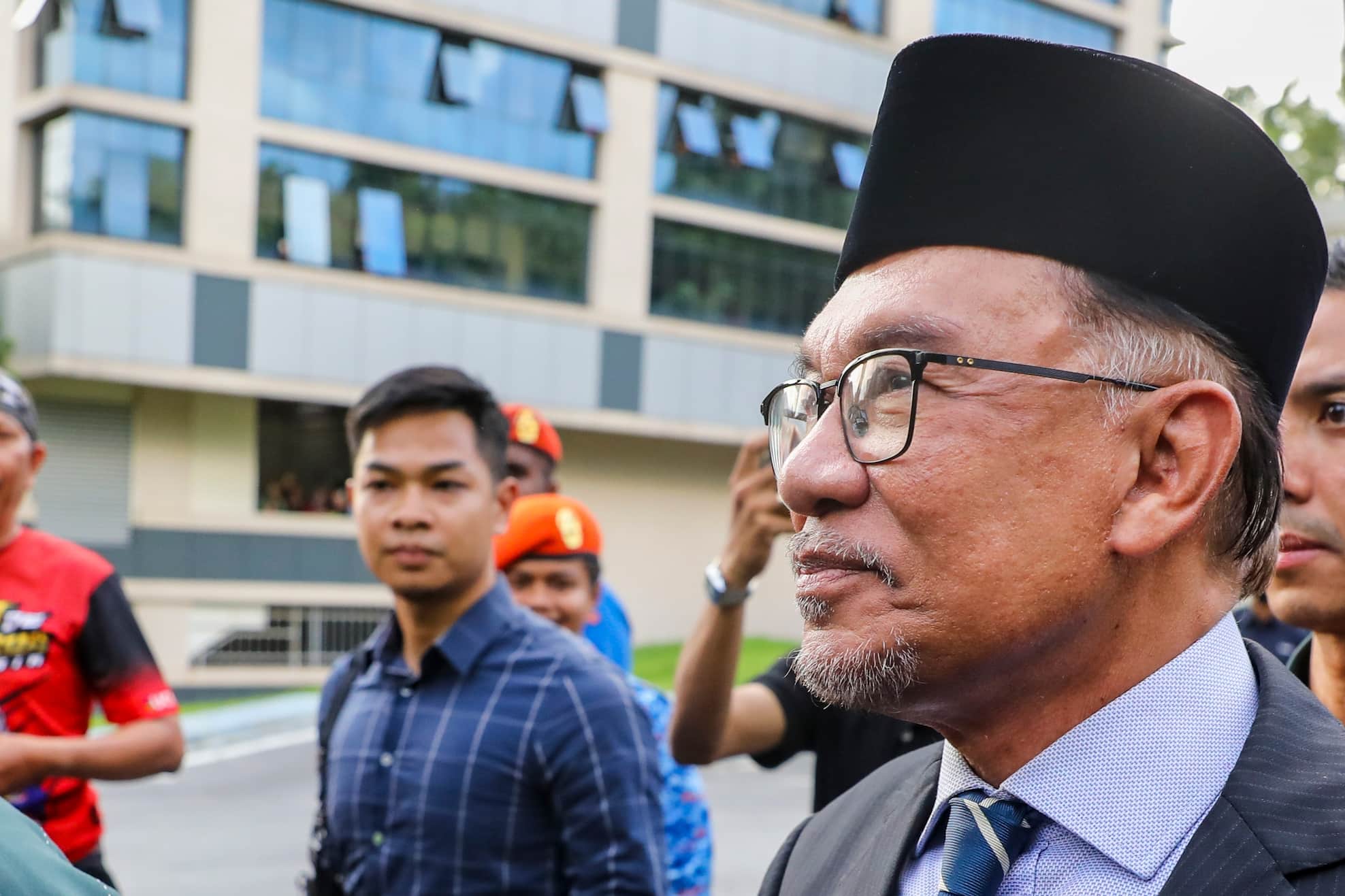 Malaysian Prime Minister Anwar Ibrahim speaks at a press conference