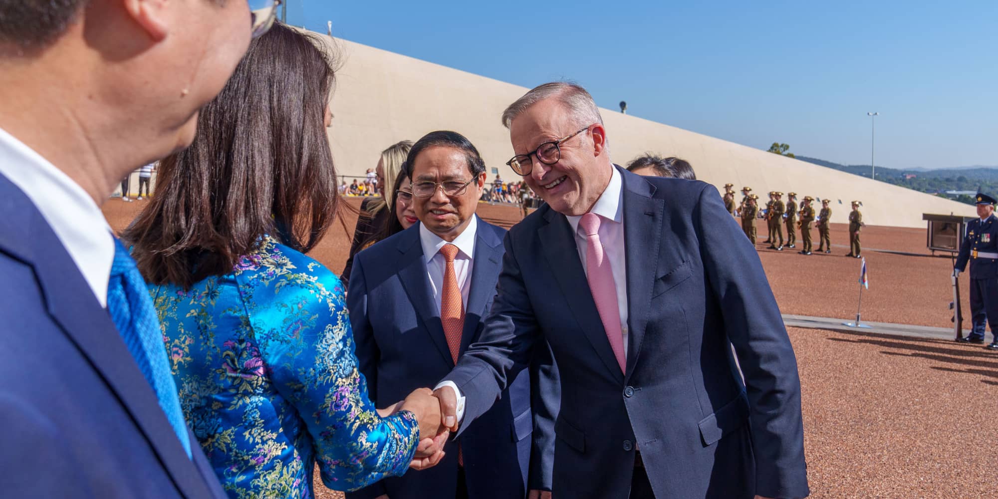 Two politicians greeting each other