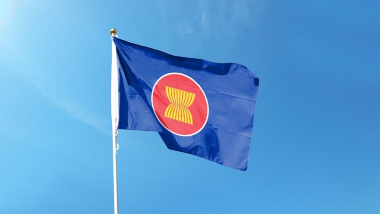 ASEAN flag waving in the sky