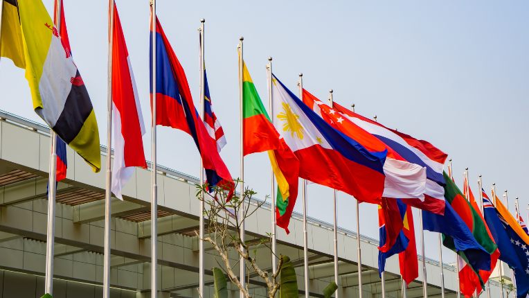 A row of diverse national flags.