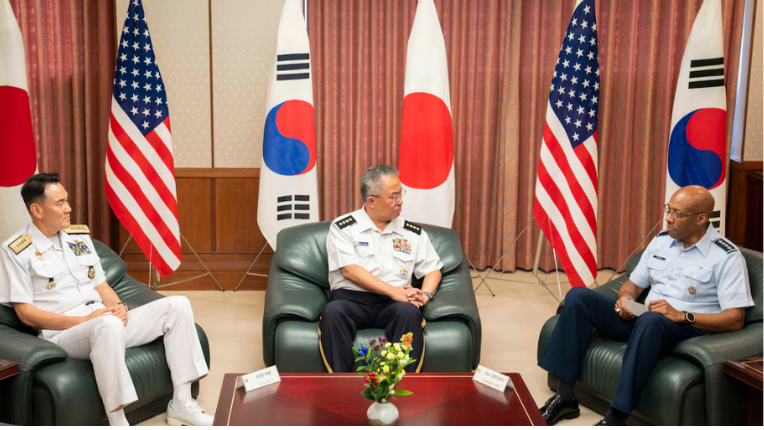 Chairman of the Joint Chiefs of Staff, Air Force Gen. C.Q. Brown Jr, meets Japan Chief of Staff of the Joint Staff, Gen. Yoshida Yoshihide, centre, and Chairman of the South Korean Joint Chiefs of Staff, Adm. Kim Myung soo, left, in Tokyo on July 18, 2024
