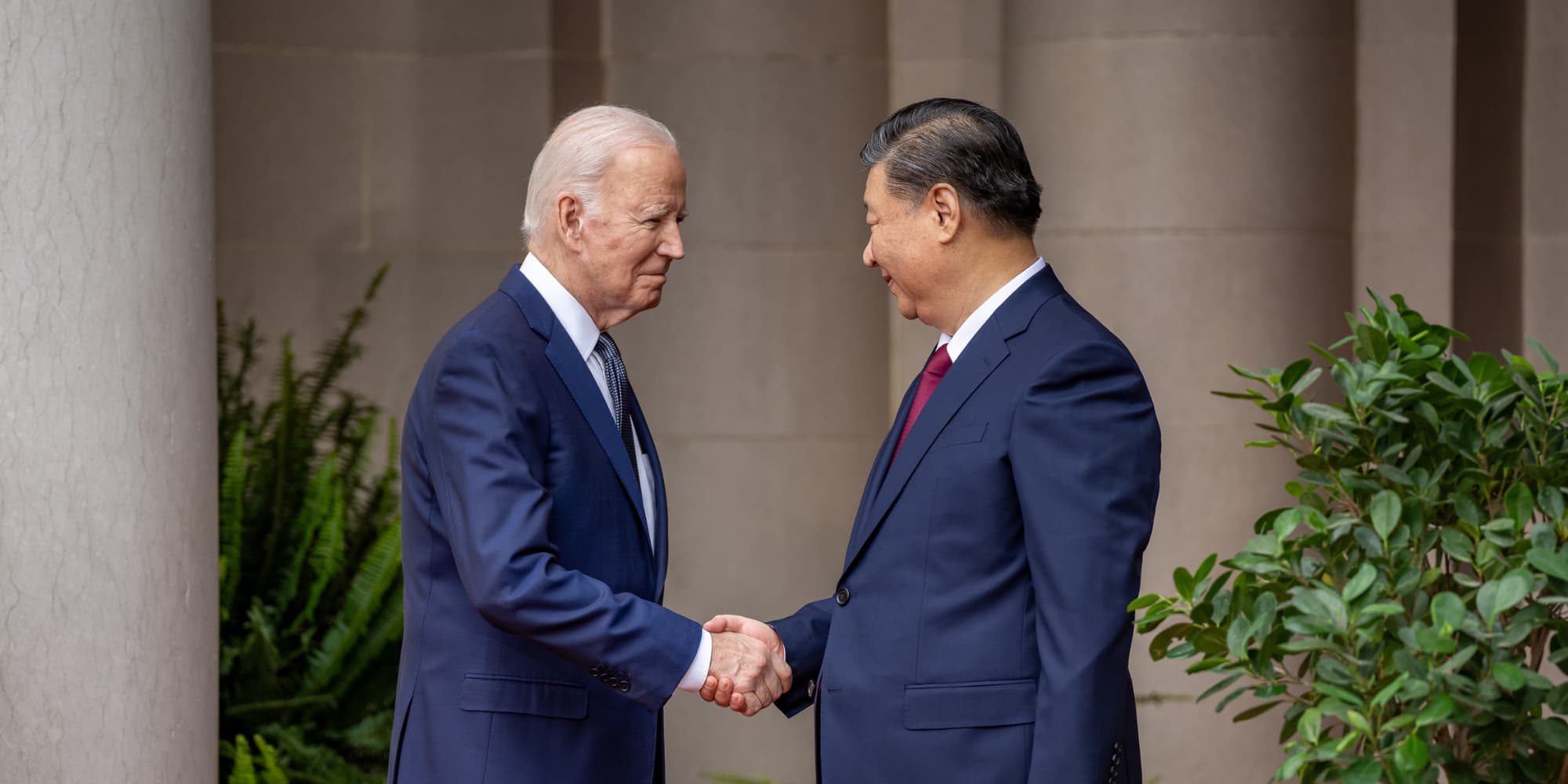 Presidents Xi and Biden shake hands
