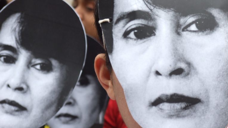 Protesters mark the anniversary of Aung San Suu Kyi's house arrest