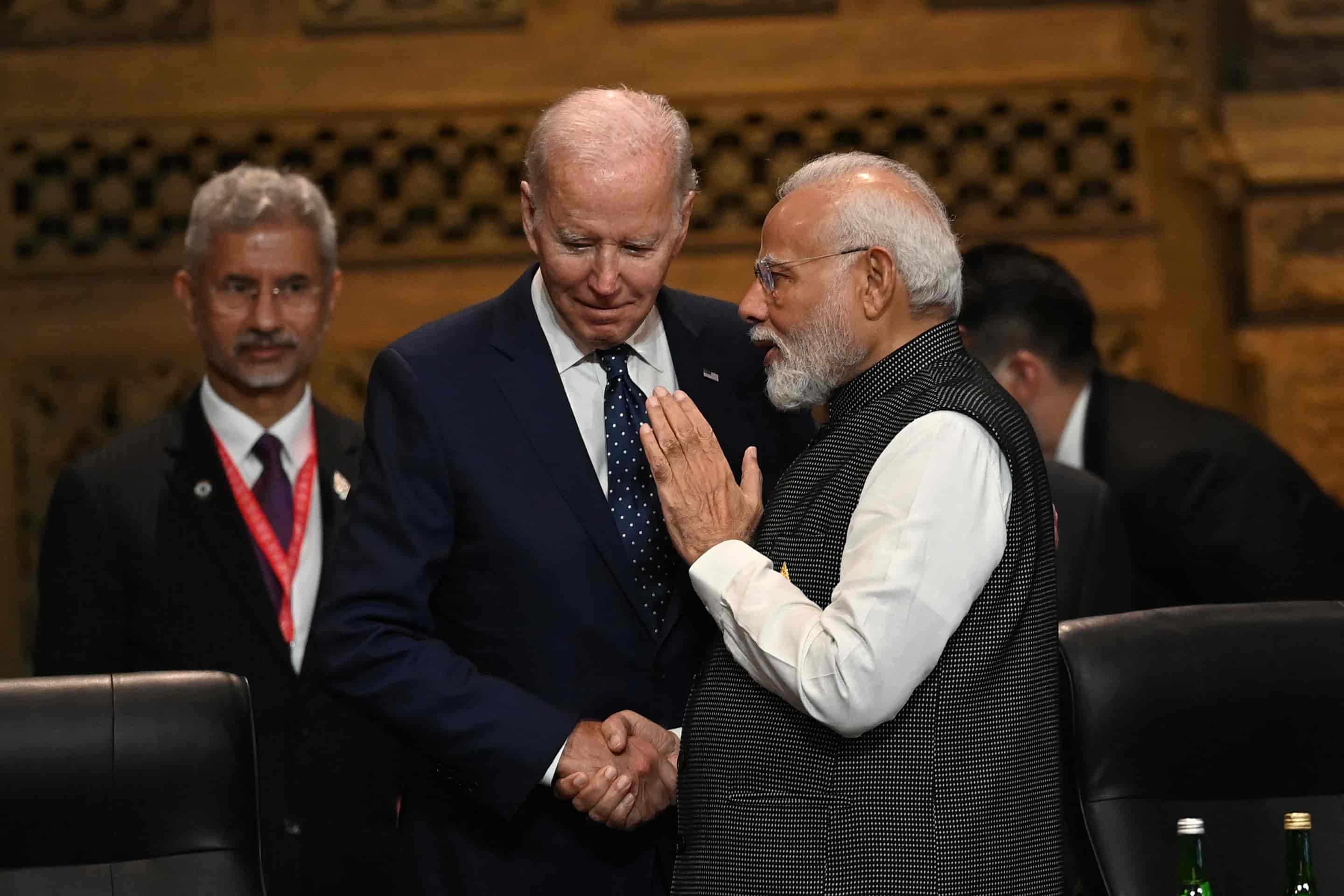 President of the U.S. Joe Biden speaks with Prime Minister of India Narendra Modi at the G20 Summit opening session in Nusa Dua