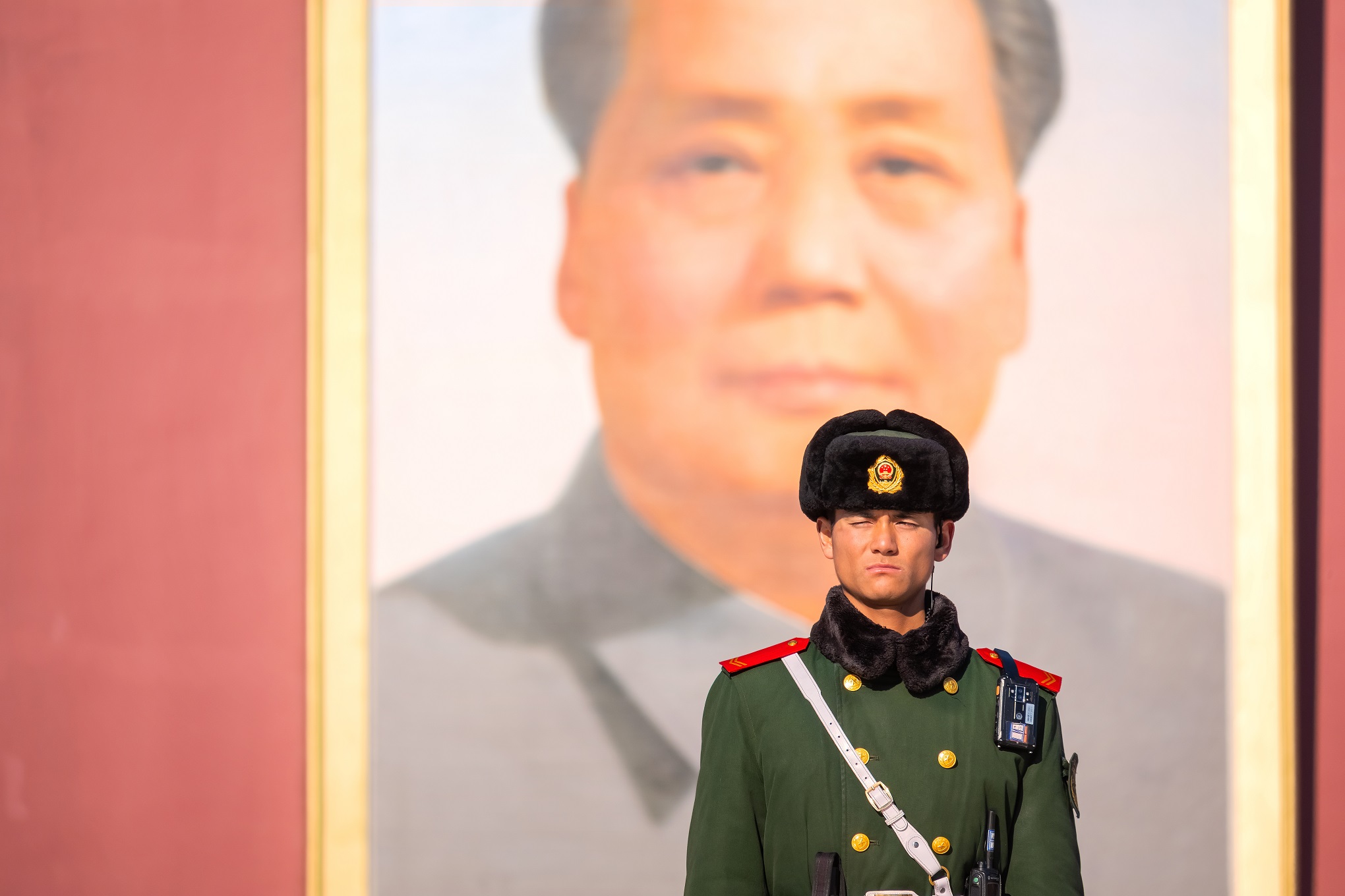 Chinese military officer stand guards at the Tiananmen Gate in front of the Forbidden City, China