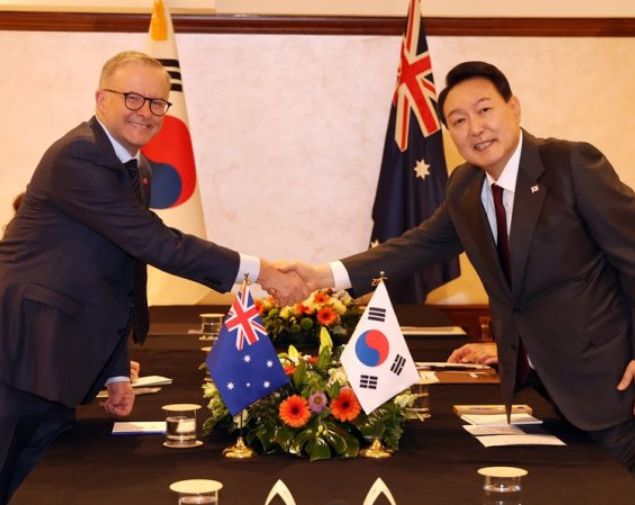 President Yoon Suk-yeol shakes hands with Australian Prime Minister Anthony Albanese