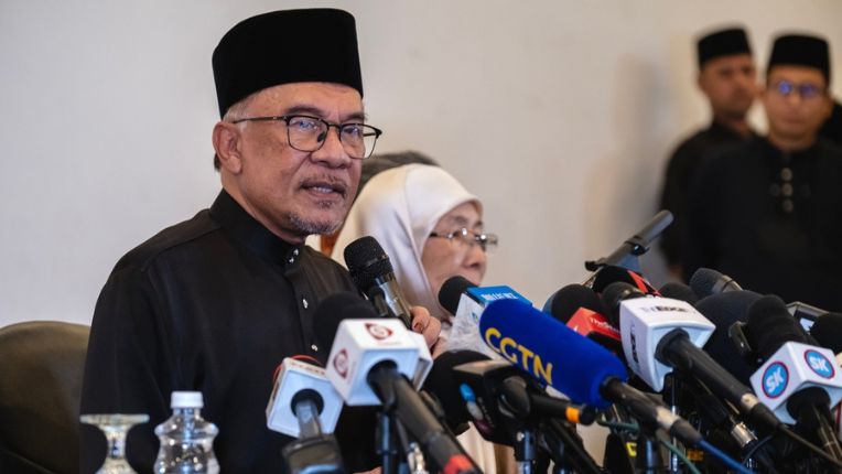 Anwar Ibrahim speaks during the press conference