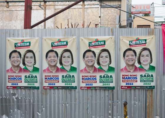 ferdiand macros and sarah duerte campaign signage 2022